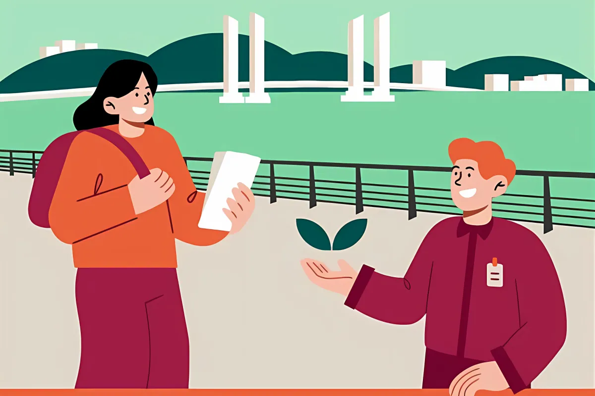 Deux personnes discutent dans un parc de Bordeaux avec des bâtiments modernes et le Pont de Pierre en arrière-plan, symbolisant un engagement écologique partagé.